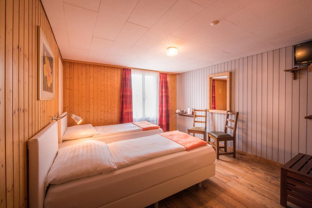 Hotel Tell And Apartments Unterseen Værelse billede
