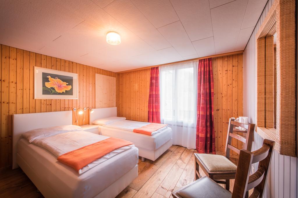 Hotel Tell And Apartments Unterseen Værelse billede